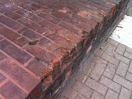 blown bricks. brick wall was taken down and rebuilt