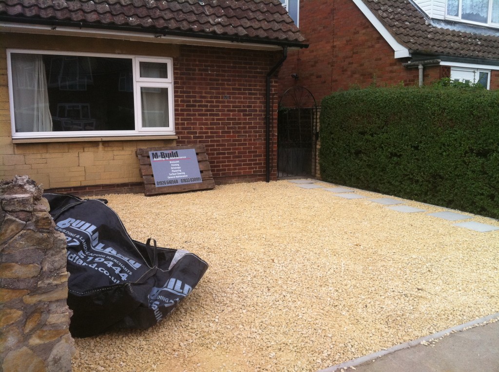 finished driveway. new sub-base, weed control, edgings and cotswild chippings. kineton, warwickshire